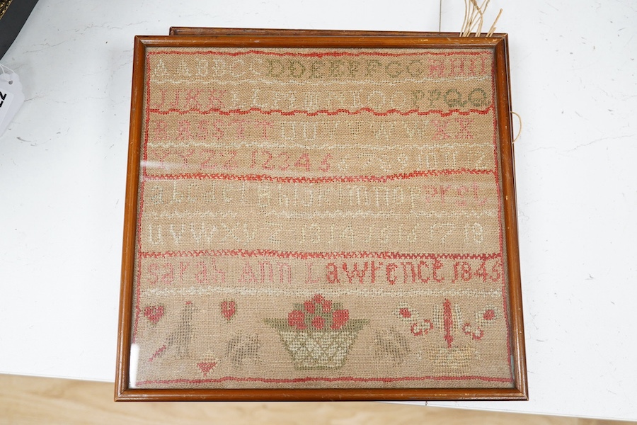 Four Victorian cross stitch samplers. One by Sarah Ann Lawrence dated 1845, another by Eliza Land dated 1856, the other two alphabet samplers, largest 26.5cm high x 27.5cm wide. Condition- two faded by age and sun light,